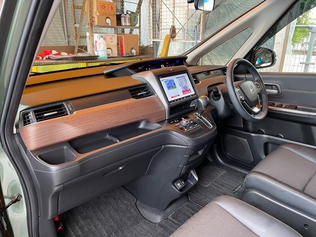 フリード クロスター・ホンダセンシング　特別仕様車　本土車両　純正９インチナビ　フルセグＴＶ　Ｂｌｕｅｔｏｏｔｈ　ＤＶＤ　ＵＳＢ　ＥＴＣ　ナビ連動純正前後ドラレコ　ナビ連動純正ＥＴＣ　バックモニター　両側パワースライドドア　ハーフレザー（28枚目）