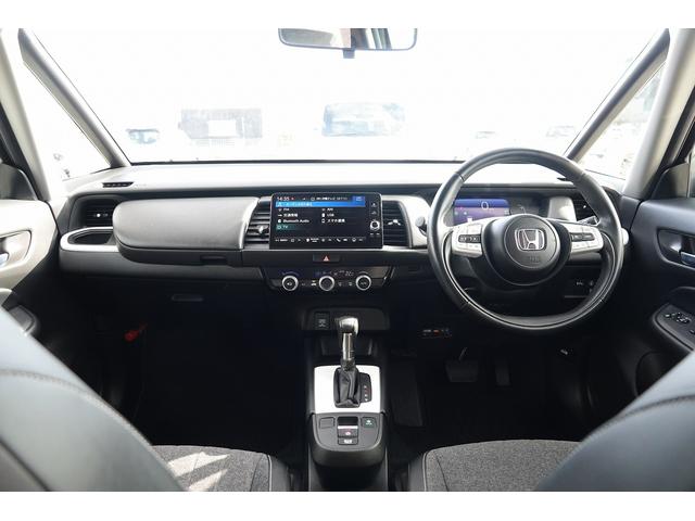 フィット ｅ：ＨＥＶホーム　ＦＯＰナビ　ドラレコ　スマートキー、ＥＴＣ、リアカメラ、カーナビ、オーディオＣＤ、ＴＶ、フロアマット、ドアバイザー　内地仕入れ　防錆済　助手席エアバッグ　運転席エアバッグ　アイドリングストップ　ＡＢＳ（15枚目）