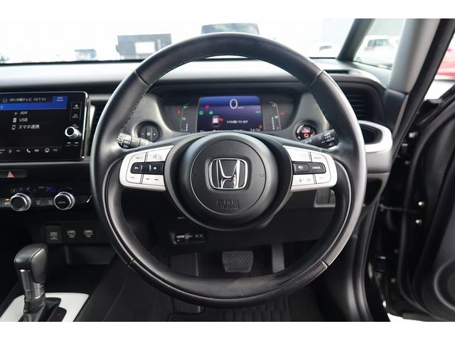 フィット ｅ：ＨＥＶホーム　ＦＯＰナビ　ドラレコ　スマートキー、ＥＴＣ、リアカメラ、カーナビ、オーディオＣＤ、ＴＶ、フロアマット、ドアバイザー　内地仕入れ　防錆済　助手席エアバッグ　運転席エアバッグ　アイドリングストップ　ＡＢＳ（16枚目）