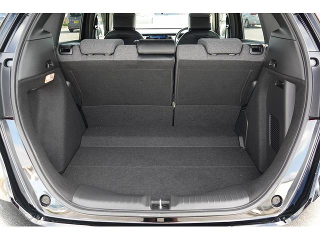 フィット ｅ：ＨＥＶホーム　ＦＯＰナビ　ドラレコ　スマートキー、ＥＴＣ、リアカメラ、カーナビ、オーディオＣＤ、ＴＶ、フロアマット、ドアバイザー　内地仕入れ　防錆済　助手席エアバッグ　運転席エアバッグ　アイドリングストップ　ＡＢＳ（18枚目）