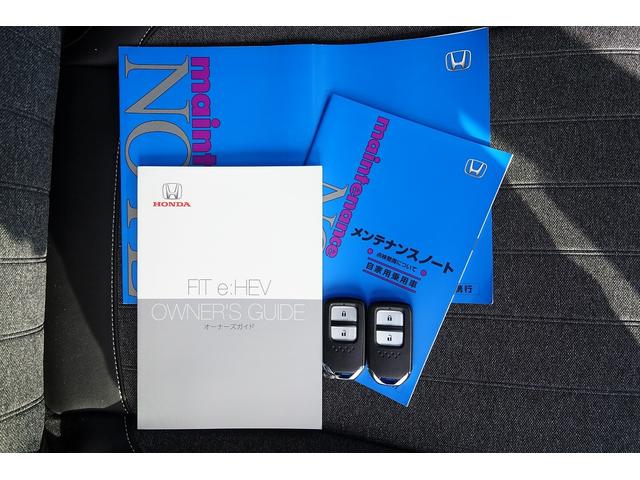 フィット ｅ：ＨＥＶホーム　ＦＯＰナビ　ドラレコ　スマートキー、ＥＴＣ、リアカメラ、カーナビ、オーディオＣＤ、ＴＶ、フロアマット、ドアバイザー　内地仕入れ　防錆済　助手席エアバッグ　運転席エアバッグ　アイドリングストップ　ＡＢＳ（46枚目）