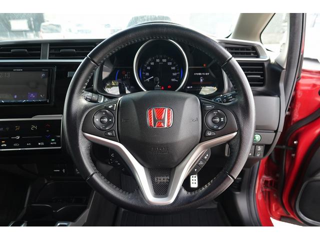 フィットハイブリッド Ｌホンダセンシング　社外オーディオ　スマートキー、リアカメラ、オーディオＣＤ、ドアバイザー　防錆済　Ｒカメ　ＬＥＤ　サイドＳＲＳ　横滑り防止　ドライブレコーダー　パワーステアリング　オートクルーズ　ＥＴＣ車載器　ＡＢＳ（16枚目）