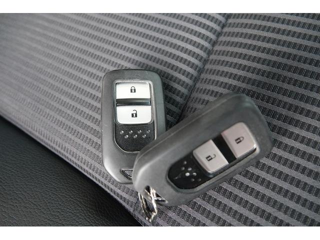 フィットハイブリッド Ｌホンダセンシング　社外オーディオ　スマートキー、リアカメラ、オーディオＣＤ、ドアバイザー　防錆済　Ｒカメ　ＬＥＤ　サイドＳＲＳ　横滑り防止　ドライブレコーダー　パワーステアリング　オートクルーズ　ＥＴＣ車載器　ＡＢＳ（47枚目）