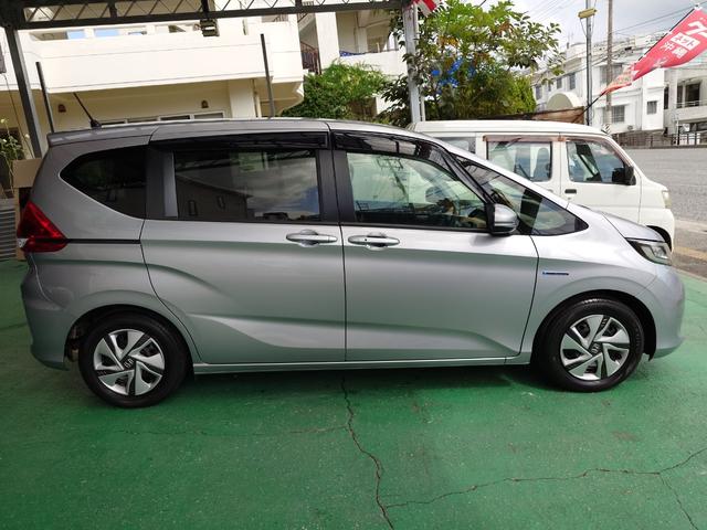フリードハイブリッド ハイブリッド・Ｇホンダセンシング　ドライブレコーダー　ＥＴＣ　バックカメラ　ナビ　ＴＶ　オートクルーズコントロール　レーンアシスト　衝突被害軽減システム　両側電動スライドドア　オートライト　ＬＥＤヘッドランプ　スマートキー（14枚目）