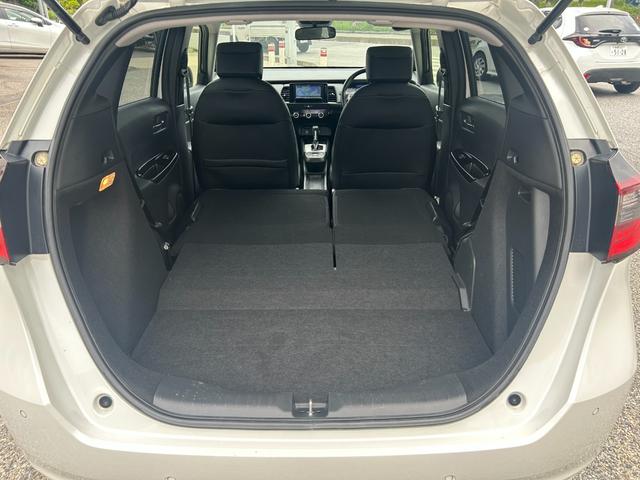 フィット ｅ：ＨＥＶホーム　ナビＴＶ，ＣＤ，ＤＶＤ、バックカメラ、禁煙車、ＬＥＤヘッドライト、オートライト、オートハイビーム、ＥＴＣ、キーレス、Ｂｌｕｅｔｏｏｔｈ（26枚目）