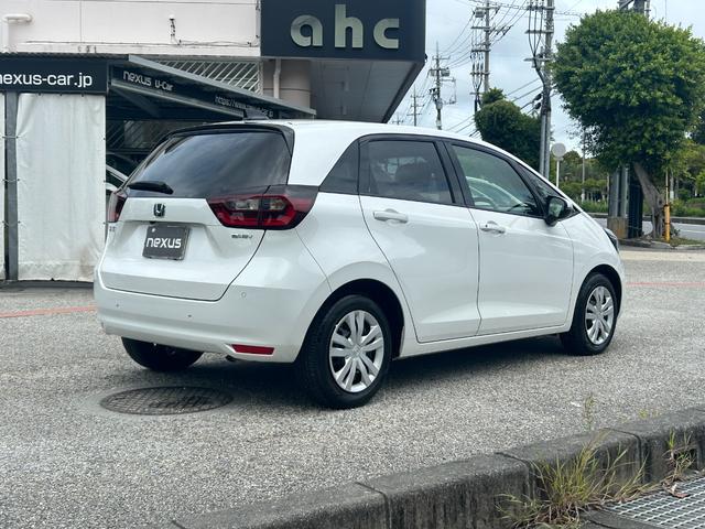 フィット ｅ：ＨＥＶホーム　ナビＴＶ，ＣＤ，ＤＶＤ、バックカメラ、禁煙車、ＬＥＤヘッドライト、オートライト、オートハイビーム、ＥＴＣ、キーレス、Ｂｌｕｅｔｏｏｔｈ（54枚目）