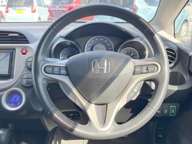 フィットハイブリッド スマートセレクション　ファインスタイル　１年保証　フルエアロ　バックカメラ　ハーフレザーシート　ドラレコ　スマートキー　ＨＩＤ　ＥＴＣ　クルコン　オートライト　オートエアコン　Ｂｌｕｅｔｏｏｔｈ　ＣＤ　ＤＶＤ　フルセグ（12枚目）