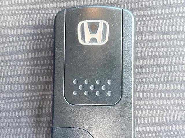 フィットハイブリッド スマートセレクション　ファインスタイル　１年保証　フルエアロ　バックカメラ　ハーフレザーシート　ドラレコ　スマートキー　ＨＩＤ　ＥＴＣ　クルコン　オートライト　オートエアコン　Ｂｌｕｅｔｏｏｔｈ　ＣＤ　ＤＶＤ　フルセグ（64枚目）