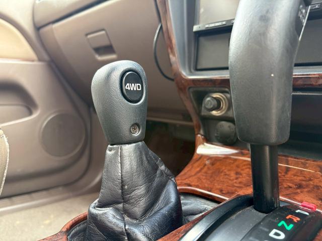 ハイラックスサーフ ＳＳＲ－Ｘ　プレミアムセレクション　☆ハーフレザーシート☆４ＷＤ☆１ＫＺターボエンジン☆社外ナビ☆　リアマウントスペアタイヤ☆　リアスポイラー☆　トレーラーヒッチマウント☆１６インチ純正ホイル（23枚目）