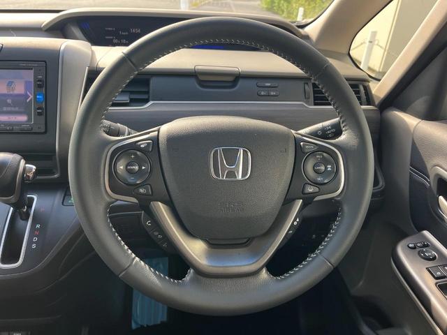 フリード Ｇ・ホンダセンシング　１年保証付　両側電動ドア　バックカメラ　衝突被害軽減システム　レーダークルーズ　禁煙車　ハーフレザーシート　ドラレコ　コーナーセンサー　スマートキー　ビルトインＥＴＣ　純正１５インチアルミ（13枚目）