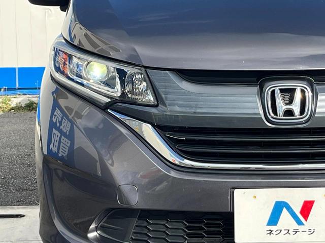 フリード Ｇ・ホンダセンシング　１年保証付　両側電動ドア　バックカメラ　衝突被害軽減システム　レーダークルーズ　禁煙車　ハーフレザーシート　ドラレコ　コーナーセンサー　スマートキー　ビルトインＥＴＣ　純正１５インチアルミ（14枚目）