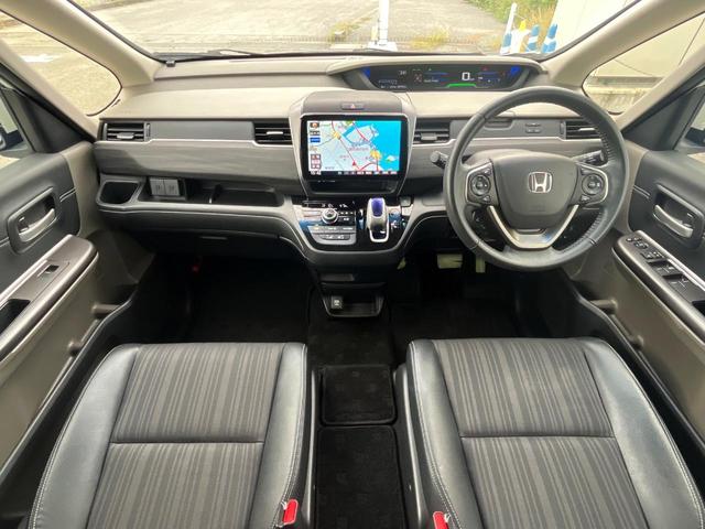 フリードハイブリッド ハイブリッド・ＥＸ　１年保証付　両側電動ドア　衝突被害軽減システム　レーダークルーズ　禁煙車　ハーフレザーシート　コーナーセンサー　スマートキー　ＬＥＤヘッド　ビルトインＥＴＣ　純正１５インチアルミ　車線逸脱警報（2枚目）