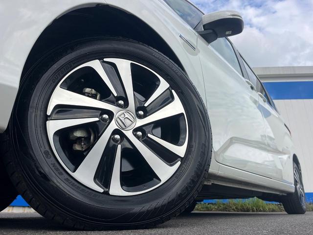 フリードハイブリッド ハイブリッド・ＥＸ　１年保証付　両側電動ドア　衝突被害軽減システム　レーダークルーズ　禁煙車　ハーフレザーシート　コーナーセンサー　スマートキー　ＬＥＤヘッド　ビルトインＥＴＣ　純正１５インチアルミ　車線逸脱警報（15枚目）