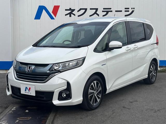 フリードハイブリッド ハイブリッド・ＥＸ　１年保証付　両側電動ドア　衝突被害軽減システム　レーダークルーズ　禁煙車　ハーフレザーシート　コーナーセンサー　スマートキー　ＬＥＤヘッド　ビルトインＥＴＣ　純正１５インチアルミ　車線逸脱警報（30枚目）