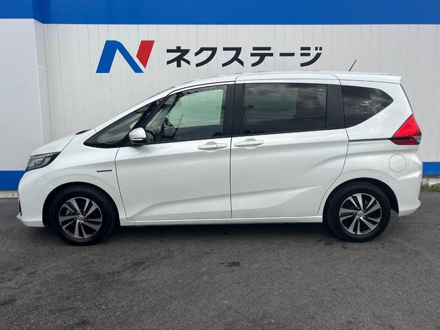 フリードハイブリッド ハイブリッド・ＥＸ　１年保証付　両側電動ドア　衝突被害軽減システム　レーダークルーズ　禁煙車　ハーフレザーシート　コーナーセンサー　スマートキー　ＬＥＤヘッド　ビルトインＥＴＣ　純正１５インチアルミ　車線逸脱警報（31枚目）