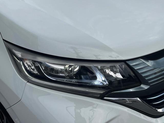 フリードハイブリッド ハイブリッド・ＥＸ　１年保証付　両側電動ドア　衝突被害軽減システム　レーダークルーズ　禁煙車　ハーフレザーシート　コーナーセンサー　スマートキー　ＬＥＤヘッド　ビルトインＥＴＣ　純正１５インチアルミ　車線逸脱警報（34枚目）