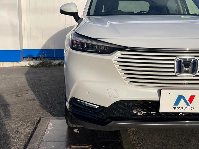 ヴェゼル ｅ：ＨＥＶ　Ｚ　１年保証付　レンタアップ　ＳＤナビ　バックカメラ　衝突被害軽減システム　レーダークルーズ　禁煙車　電動リアゲート　ハーフレザーシート　コーナーセンサー　スマートキー　ＬＥＤヘッド　ＥＴＣ（13枚目）