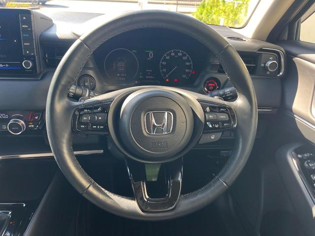 ヴェゼル ｅ：ＨＥＶ　Ｚ　１年保証付　バックカメラ　衝突被害軽減システム　レーダークルーズ　禁煙車　電動リアゲート　ハーフレザーシート　ドラレコ　コーナーセンサー　スマートキー　ＬＥＤヘッド　ＥＴＣ　純正１８インチアルミ（12枚目）