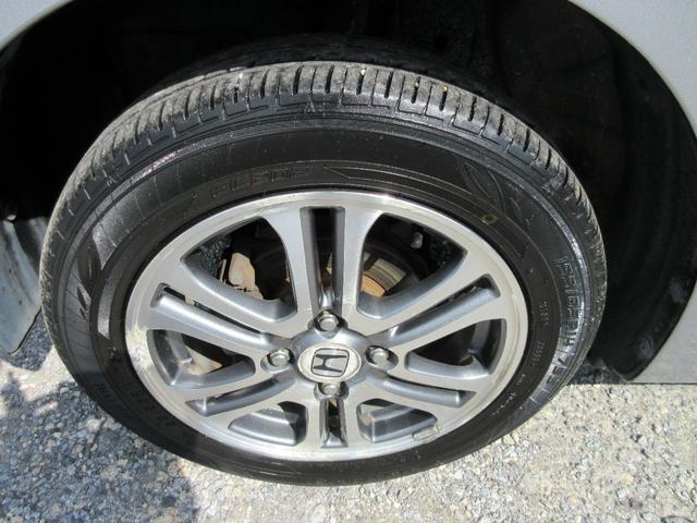 純正１４インチアルミホイール付き。