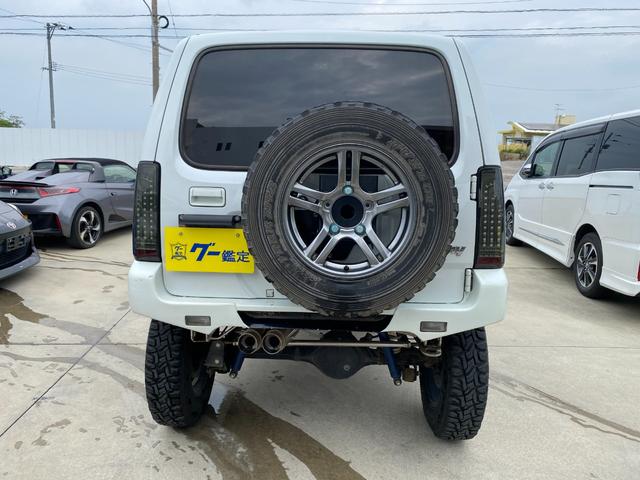 ジムニー 　Ｘアドベンチャー　５ＭＴ　県外仕入れ　リフトアップ　社外マフラー　社外バンパー　ＴＶ　４ＷＤ　ナビ　ＴＶ　電動格納ミラー　シートヒーター　　ＣＤ　ＵＳＢ　アルミホイール　エアコン　パワーウィンドウ（18枚目）