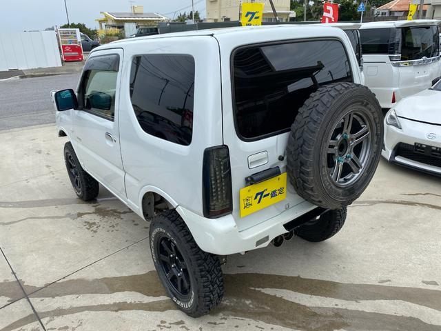 ジムニー 　Ｘアドベンチャー　５ＭＴ　県外仕入れ　リフトアップ　社外マフラー　社外バンパー　ＴＶ　４ＷＤ　ナビ　ＴＶ　電動格納ミラー　シートヒーター　　ＣＤ　ＵＳＢ　アルミホイール　エアコン　パワーウィンドウ（19枚目）