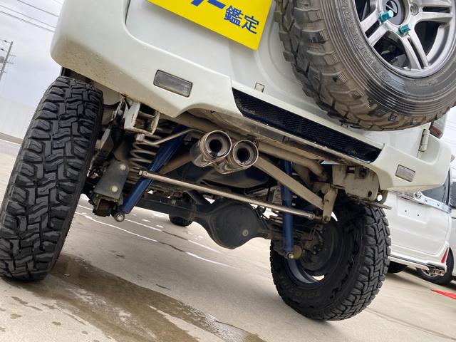 ジムニー 　Ｘアドベンチャー　５ＭＴ　県外仕入れ　リフトアップ　社外マフラー　社外バンパー　ＴＶ　４ＷＤ　ナビ　ＴＶ　電動格納ミラー　シートヒーター　　ＣＤ　ＵＳＢ　アルミホイール　エアコン　パワーウィンドウ（22枚目）
