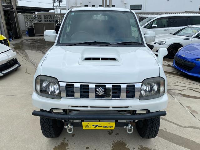 ジムニー 　Ｘアドベンチャー　５ＭＴ　県外仕入れ　リフトアップ　社外マフラー　社外バンパー　ＴＶ　４ＷＤ　ナビ　ＴＶ　電動格納ミラー　シートヒーター　　ＣＤ　ＵＳＢ　アルミホイール　エアコン　パワーウィンドウ（28枚目）