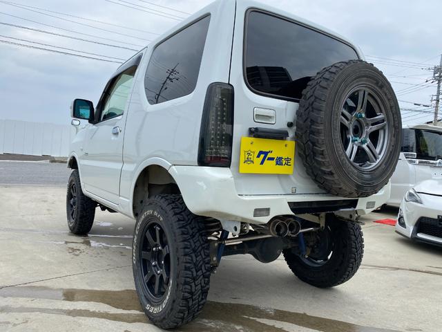 ジムニー 　Ｘアドベンチャー　５ＭＴ　県外仕入れ　リフトアップ　社外マフラー　社外バンパー　ＴＶ　４ＷＤ　ナビ　ＴＶ　電動格納ミラー　シートヒーター　　ＣＤ　ＵＳＢ　アルミホイール　エアコン　パワーウィンドウ（29枚目）