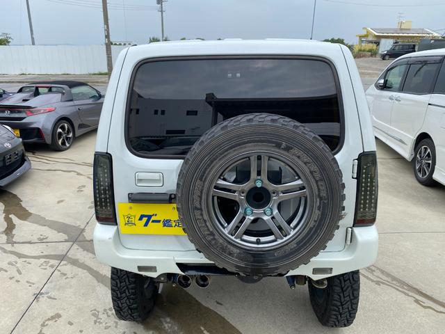 ジムニー 　Ｘアドベンチャー　５ＭＴ　県外仕入れ　リフトアップ　社外マフラー　社外バンパー　ＴＶ　４ＷＤ　ナビ　ＴＶ　電動格納ミラー　シートヒーター　　ＣＤ　ＵＳＢ　アルミホイール　エアコン　パワーウィンドウ（30枚目）