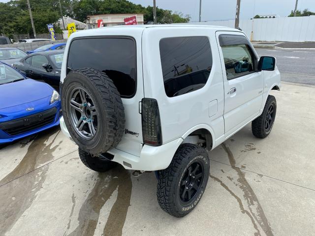 ジムニー 　Ｘアドベンチャー　５ＭＴ　県外仕入れ　リフトアップ　社外マフラー　社外バンパー　ＴＶ　４ＷＤ　ナビ　ＴＶ　電動格納ミラー　シートヒーター　　ＣＤ　ＵＳＢ　アルミホイール　エアコン　パワーウィンドウ（31枚目）