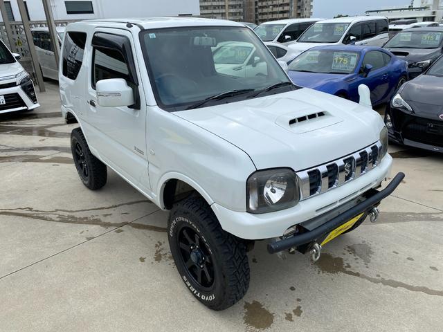 ジムニー 　Ｘアドベンチャー　５ＭＴ　県外仕入れ　リフトアップ　社外マフラー　社外バンパー　ＴＶ　４ＷＤ　ナビ　ＴＶ　電動格納ミラー　シートヒーター　　ＣＤ　ＵＳＢ　アルミホイール　エアコン　パワーウィンドウ（32枚目）