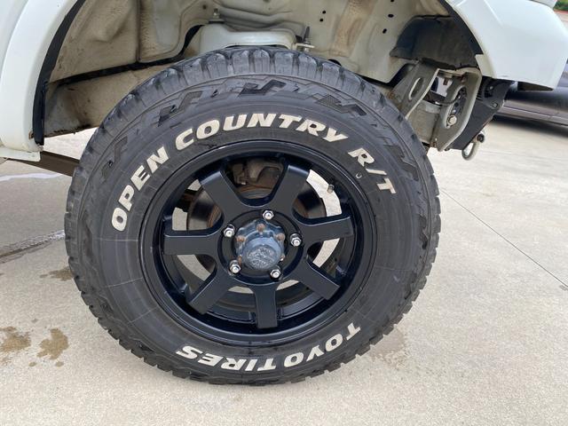 ジムニー 　Ｘアドベンチャー　５ＭＴ　県外仕入れ　リフトアップ　社外マフラー　社外バンパー　ＴＶ　４ＷＤ　ナビ　ＴＶ　電動格納ミラー　シートヒーター　　ＣＤ　ＵＳＢ　アルミホイール　エアコン　パワーウィンドウ（35枚目）