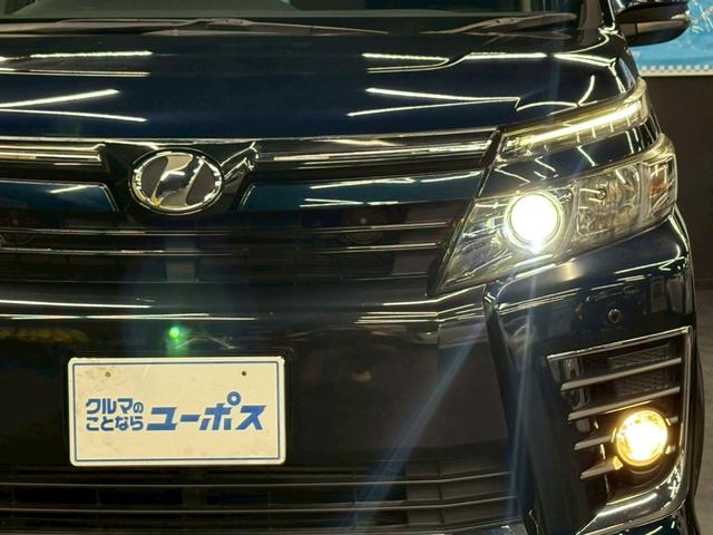 ヴォクシー ＺＳ　フリップダウンモニター　純正ＳＤナビ　バックモニター　アイドリングストップ　ステアリングスイッチ　ドライブレコーダー　両側パワースライドドア　スマートキー　ＥＴＣ　県内買取車両　保証対象車両（24枚目）