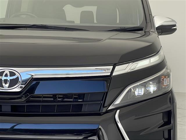 ヴォクシー ＺＳ　煌ＩＩＩ　禁煙車　社外ナビ　ＣＤ　ＤＶＤ　Ｂｌｕｅｔｏｏｔｈ　フルセグＴＶ　トヨタセーフティセンス　両側パワースライドドア　フリップダウンモニター　クルーズコントロール　シートカバー　ＥＴＣ　ＬＥＤヘッドライト（28枚目）
