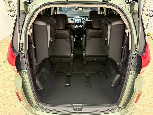 フリードハイブリッド ハイブリッド・クロスター 1オーナー 純正9型ナビ フリップダウンモニター 衝突軽減 レーンキープアシスト クルーズコントロール 両側電動 コーナーセンサー 6人乗り Bluetooth ウォークスルー バックカメラ(13枚目)