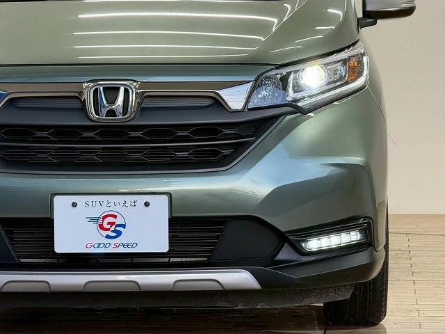 フリードハイブリッド ハイブリッド・クロスター 1オーナー 純正9型ナビ フリップダウンモニター 衝突軽減 レーンキープアシスト クルーズコントロール 両側電動 コーナーセンサー 6人乗り Bluetooth ウォークスルー バックカメラ(18枚目)