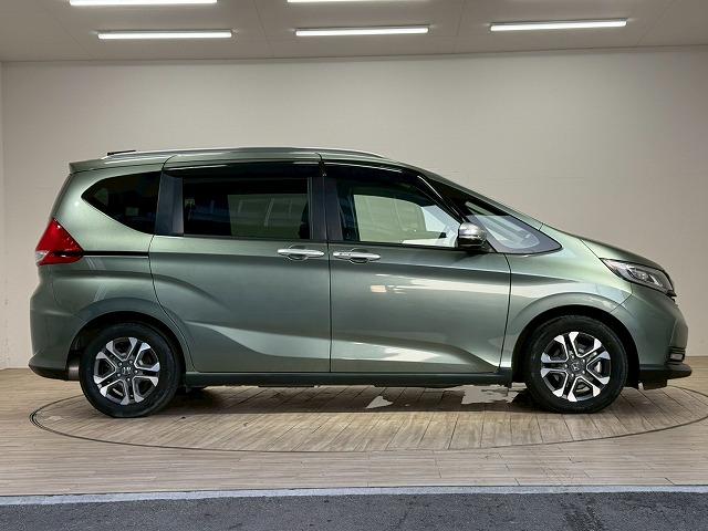 フリードハイブリッド ハイブリッド・クロスター 1オーナー 純正9型ナビ フリップダウンモニター 衝突軽減 レーンキープアシスト クルーズコントロール 両側電動 コーナーセンサー 6人乗り Bluetooth ウォークスルー バックカメラ(28枚目)