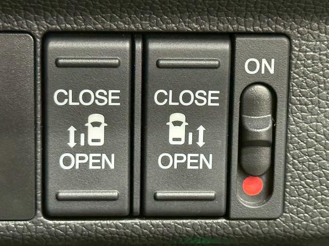 フリードハイブリッド ハイブリッド・クロスター 1オーナー 純正9型ナビ フリップダウンモニター 衝突軽減 レーンキープアシスト クルーズコントロール 両側電動 コーナーセンサー 6人乗り Bluetooth ウォークスルー バックカメラ(60枚目)