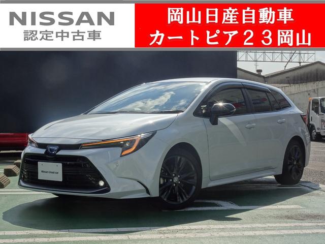 カローラツーリング ハイブリッド　ダブルバイビー　★日産認定中古車★１年保証付き★ワンオーナー★禁煙車★メーカーナビ★バックモニター★ＥＴＣ２．０★ドライブレコーダー★クルーズコントロール★ステアリング・シートヒーター★（1枚目）