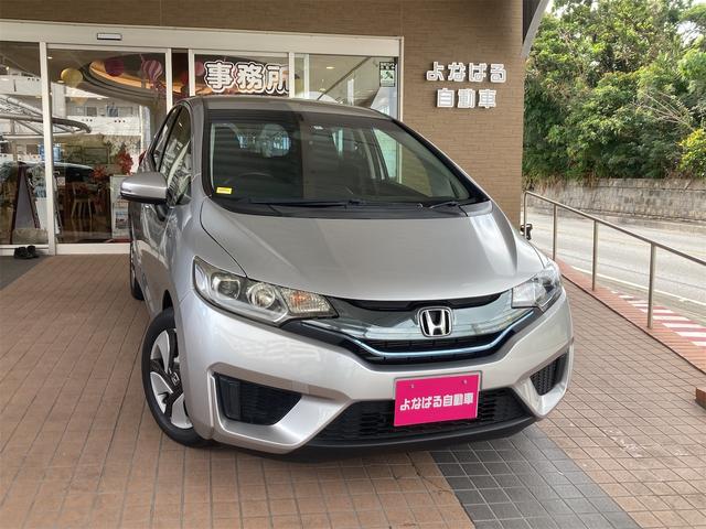 沖縄県の中古車ならフィットハイブリッド Ｌパッケージ　純正フルセグインターナビ　Ｂｌｕｅｔｏｏｔｈ　バックカメラ　ＥＴＣ　クルーズコントロール　ハーフレザーシート