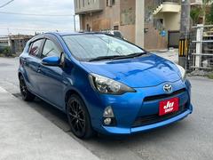 アクア S スマートキー&プッシュスタート、ETC、ブルートゥース、フルセグナビテレビ&バックモニター、ステアリングスイッチ、禁煙車、16インチ社外ホイール、レザーシートカバー、フォグランプ、自動コーナーポール 中古車画像