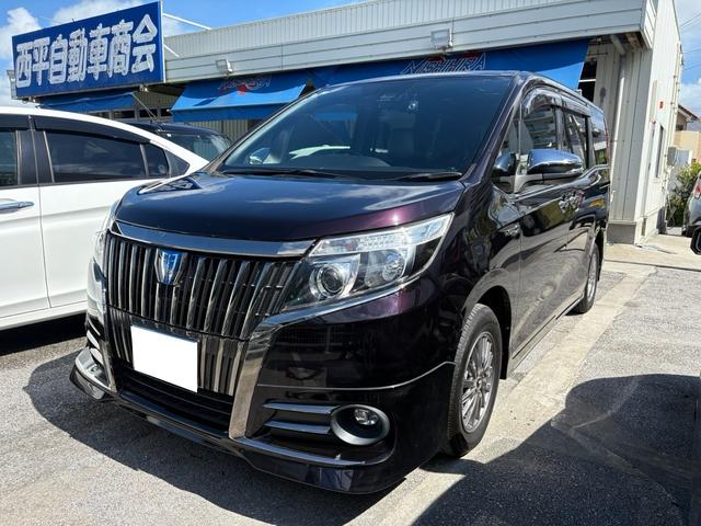 沖縄県の中古車ならエスクァイア ハイブリッドＧｉ　ブラックテーラード　ナビ　ＴＶ　ＤＶＤ　Ｂｌｕｅｔｏｏｔｈ　バックカメラ　衝突軽減ブレーキ　両側電動スライドドア　フリップダウンモニター