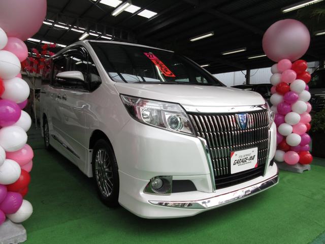 沖縄県の中古車ならエスクァイア ハイブリッドＧｉ　・純正９インチナビ＆純正１１インチリヤモニター・ＬＥＤライト・バックカメラ・黒革・モデリスタエアロ