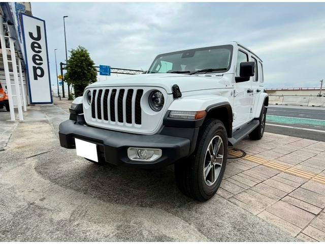 ジープ・ラングラーアンリミテッド(ジープ) サハラ　ワンオーナー／レザーシート／走行距離５３００ｋｍ／バック・サイド・フロントカメラ／クルーズコントロール／盗難防止システム／ＥＴＣ／ナビ／防眩カメラ／ｃａｒｐｌａｙ／ＢＳＭ／シートヒーター／スマートキー 中古車画像