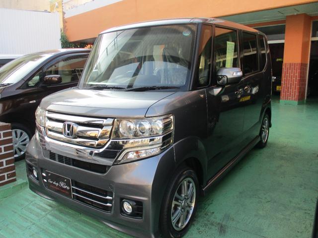 沖縄県の中古車ならＮ－ＢＯＸカスタム Ｇ・Ｌパッケージ　９インチナビ・ＴＶ・ＣＤ・Ｂｌｕｅｔｏｏｔｈ・バックモニター付　片側パワースライドドア機能付　キセノンライト　ウインカードアミラー機能　プッシュスタート機能