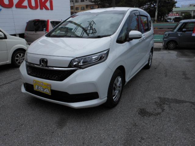 沖縄の中古車 ホンダ フリード 車両価格 260万円 リ済込 2022(令和4)年 200km パールホワイト