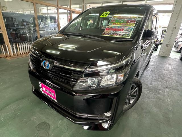 沖縄県の中古車ならヴォクシー ハイブリッドＶ　純正ナビ　バックカメラ　Ｂｌｕｅｔｏｏｔｈ　両側パワースライドドア　ＥＴＣ　クルーズコントロール　前席シートヒーター　スマートキー　置くだけ充電