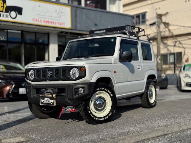 沖縄県の中古車ならジムニー ＸＬ　ＤＥＥＮクロスカントリー１６インチホイル　ＴＯＹＯオープンカントリーＲＴタイヤ　ヒッチキャリア　リアラダー　ルーフラック　Ｃ．Ｌ．ＬＩＮＫ製Ｆウインチ　リアラダー　シートヒーター　プッシュスタート