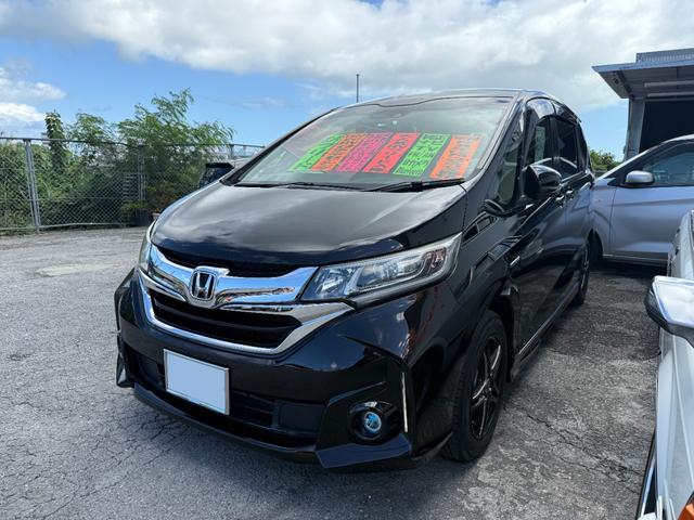 沖縄県の中古車ならフリードハイブリッド ハイブリッド・Ｇホンダセンシング　純正ナビＴＶ　ブルートゥース　両側パワースライドドア