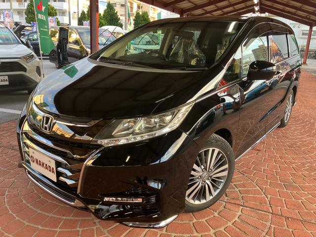 沖縄県中頭郡嘉手納町の中古車ならオデッセイ アブソルート・ホンダセンシング　８人乗り　ナビ　フルセグＴＶ　バックカメラ　衝突軽減ブレーキ　ＥＴＣ　両側パワースライドドア　ハーフレザーシート　運転席パワーシート　キープッシュスタート　アルミホイール　キーフリー　オートクルーズ